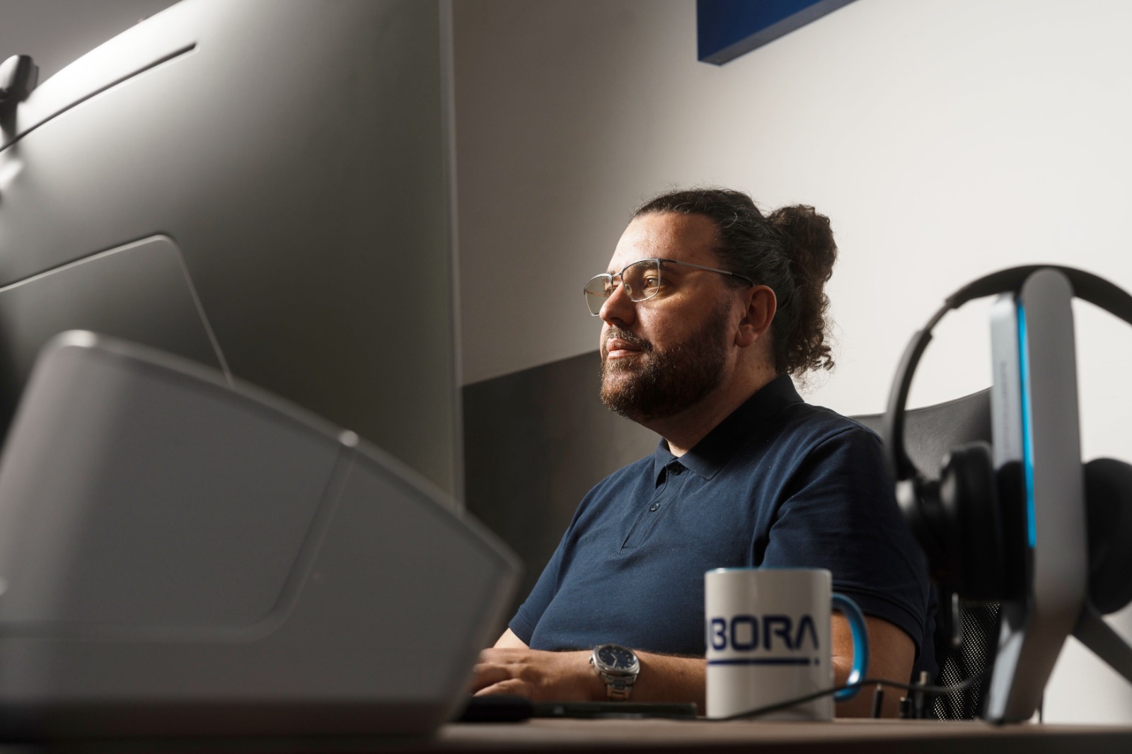 BAUBORA Mitarbeiter bei der Projektarbeit im Büro in München